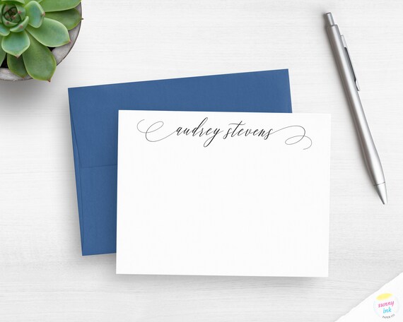 Engineer in a lab writing notes