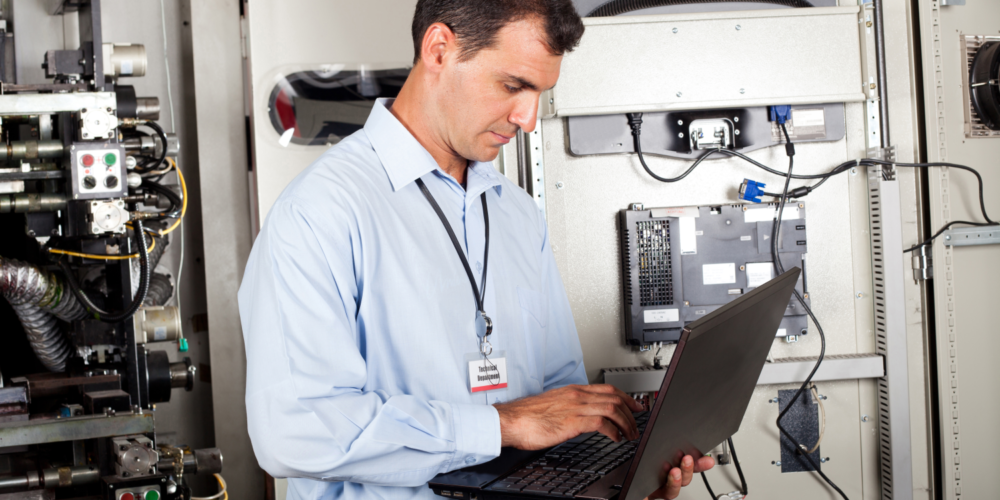 Engineer wiring instruments in a lab